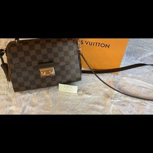 Louis Vuitton new, no tags.  Cross Body 9 x 7 in